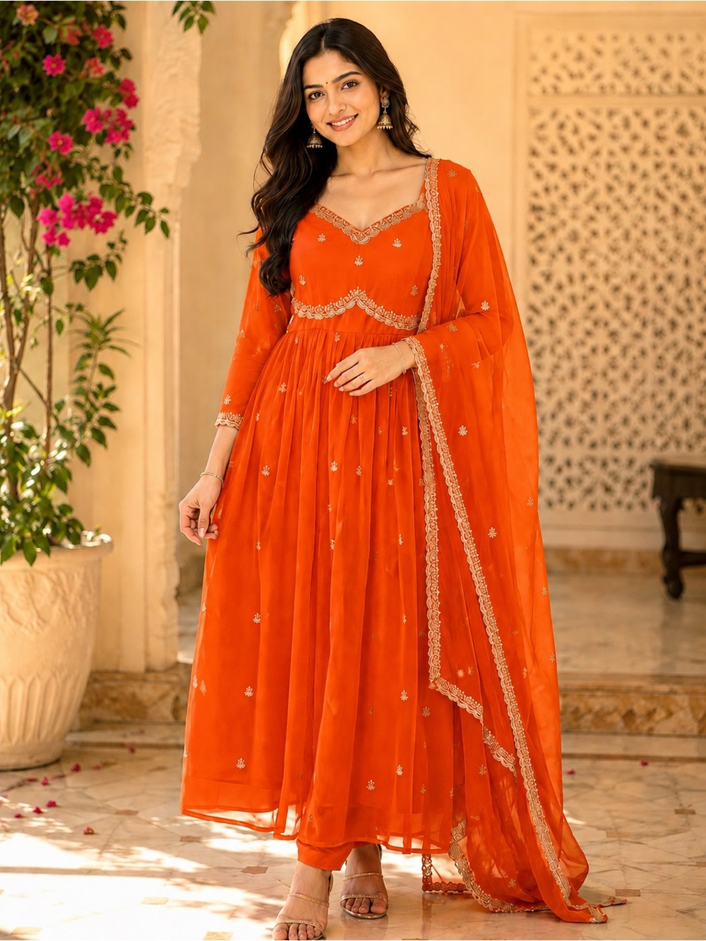 Elegant Orange Women’s Salwar with Embroidered Detailing